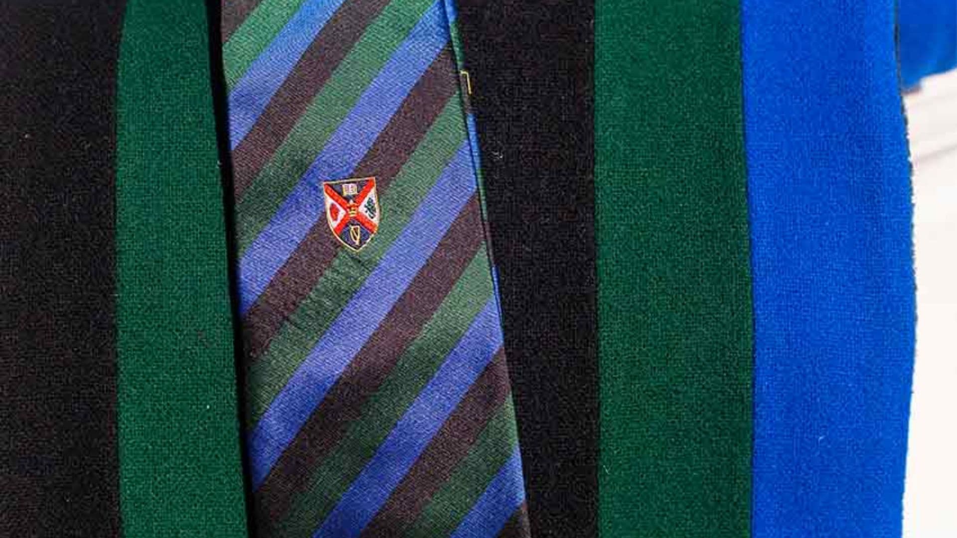 Custom university club ties with embroidered crest