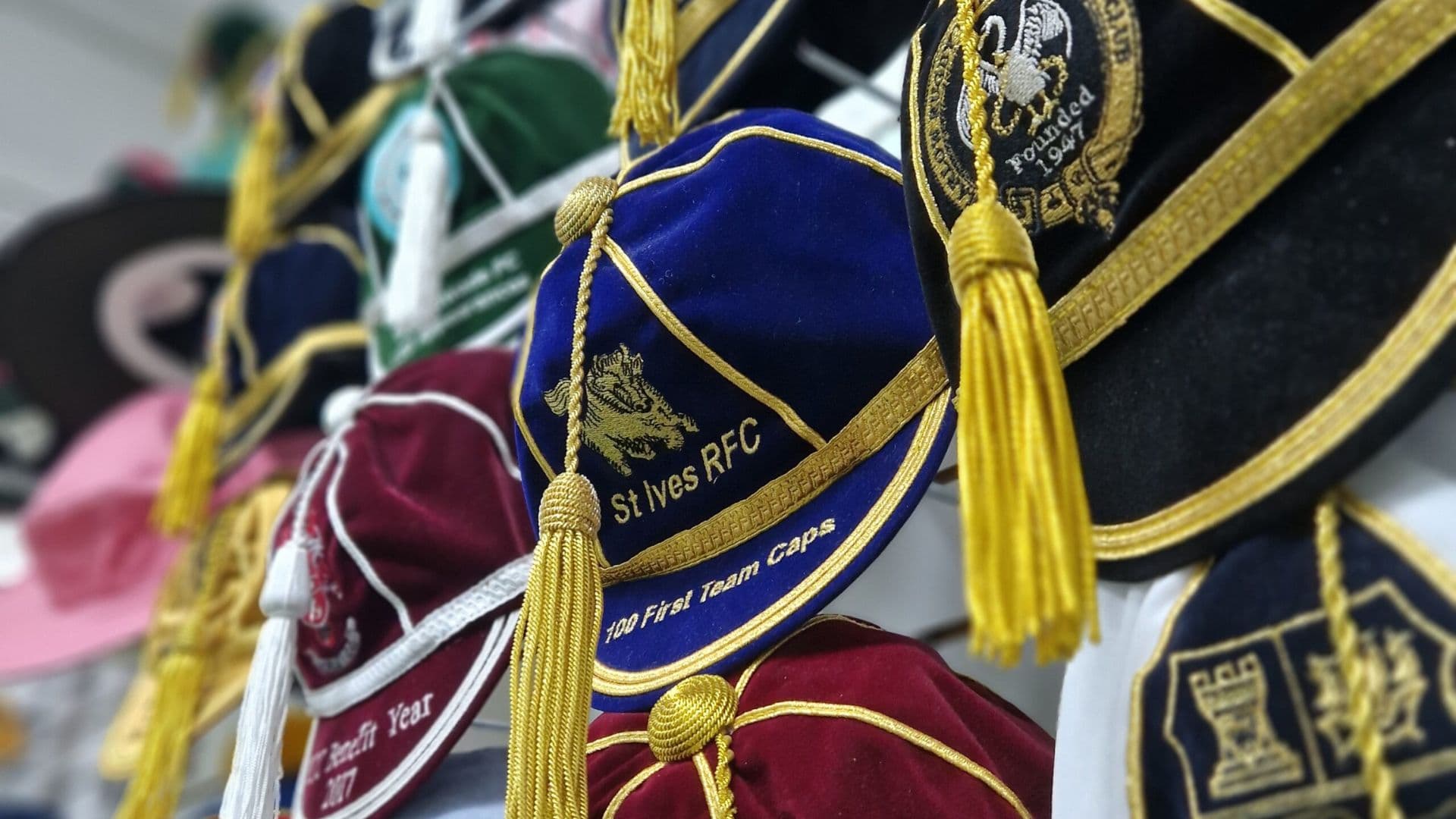 Custom sports team caps with embroidered logos